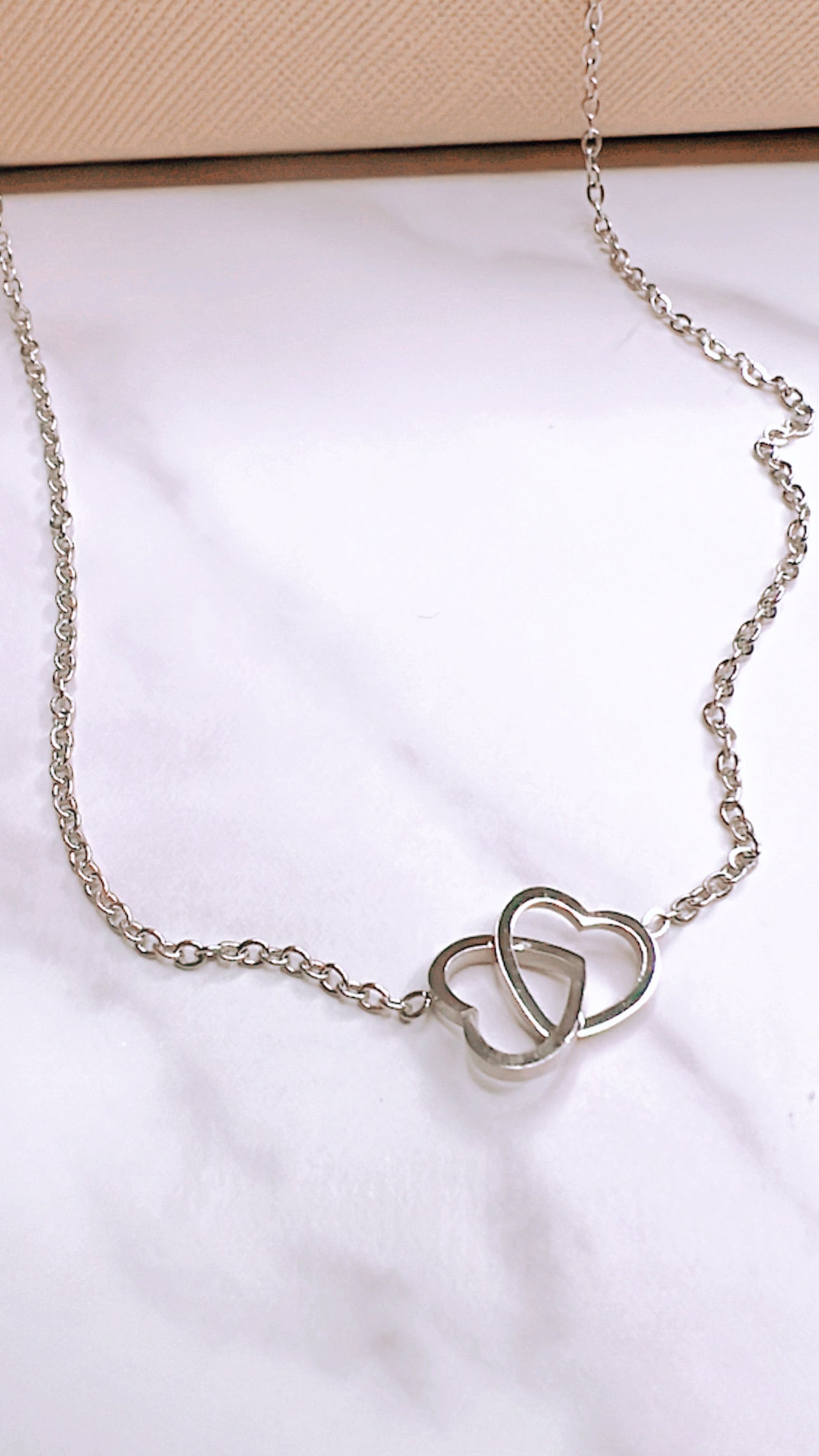 LOVE IS IN THE AIR NECKLACE