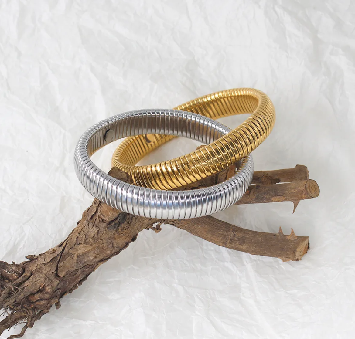 INTERTWINED BANGLE BRACELET